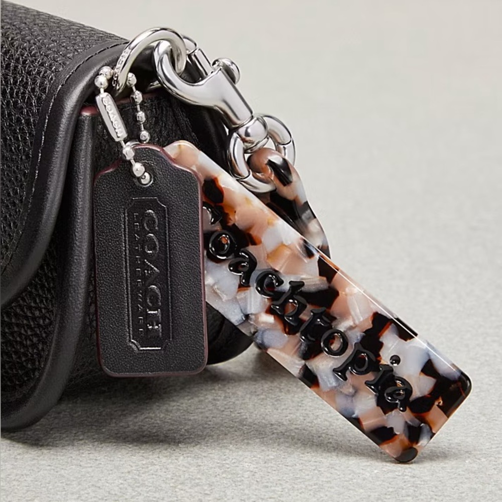 Coach Coachtopia Mini Wavy Dinky Bag with Crossbody Strap in Black Leather.
NWT - Picture 5 of 13
